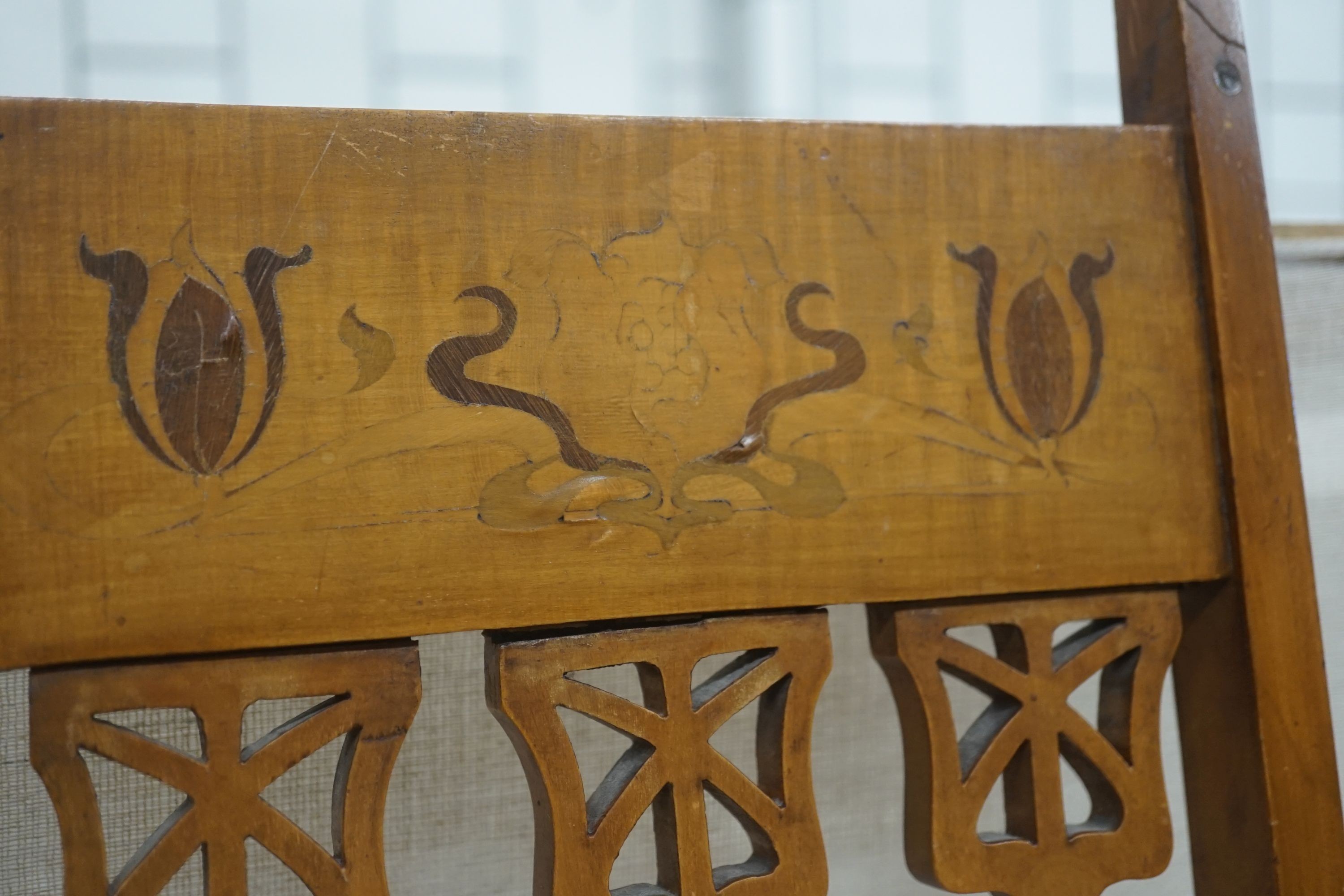 A pair of Art Nouveau inlaid mahogany chairs, one with arms